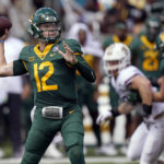 
              Baylor quarterback Blake Shapen (12) passes during the first half of an NCAA college football game against Texas State in Waco, Texas, Saturday, Sept. 17, 2022. (AP Photo/LM Otero)
            