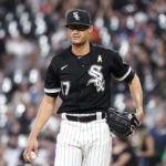 
              Chicago White Sox starting pitcher Joe Kelly looks at third base during the first inning of the team's baseball game against the Minnesota Twins in Chicago, Friday, Sept. 2, 2022. (AP Photo/Nam Y. Huh)
            