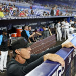
              Miami Marlins manager Don Mattingly watches from the dugout before a baseball game against the Washington Nationals, Sunday, Sept. 25, 2022, in Miami. Mattingly will not be back as manager of the Miami Marlins next season. (AP Photo/Lynne Sladky)
            
