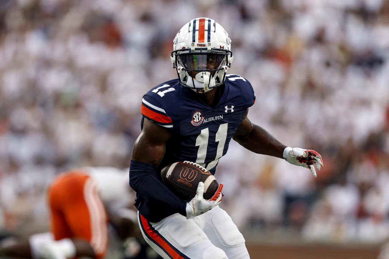 Auburn wide receiver Shedrick Jackson carries the ball against Mercer during the first half of an N...