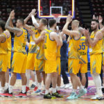 
              Ukraine's players celebrate at the end of the Eurobasket group C basketball match between Ukraine and Britain at the Assago Forum, near Milan, Italy Friday Sept. 2, 2022. Ukraine beat Britain 90-61.(AP Photo/Luca Bruno)
            
