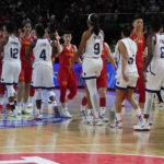 
              United States players are congratulated by China following their game at the women's Basketball World Cup in Sydney, Australia, Saturday, Sept. 24, 2022. (AP Photo/Mark Baker)
            
