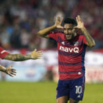 
              FC Dallas forward Jesús Ferreira (10) celebrates his goal with Paul Arriola (7) and other teammates during the first half of an MLS soccer match against the Philadelphia Union on Wednesday, Aug. 17, 2022, in Frisco, Texas. (AP Photo/LM Otero)
            