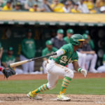 
              Oakland Athletics second baseman Tony Kemp drops his bat after hitting an RBI-single against the Chicago White Sox during the fifth inning of a baseball game in Oakland, Calif., Sunday, Sept. 11, 2022. (AP Photo/Godofredo A. Vásquez)
            