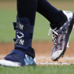 
              The 9/11 baseball cleats of New York Yankees center fielder Aaron Judge during baseball game against the Tampa Bay Rays on Sunday, Sept. 11, 2022, in New York. (AP Photo/Noah K. Murray)
            