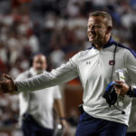 
              Auburn head coach Bryan Harsin reacts after a score during the second half of an NCAA college football game against Mercer, Saturday, Sept. 3, 2022, in Auburn, Ala. (AP Photo/Butch Dill)
            