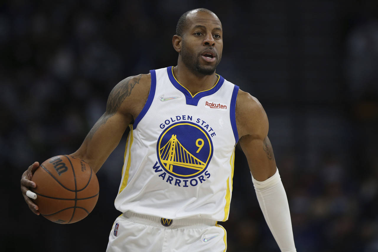 FILE - Golden State Warriors forward Andre Iguodala handles the ball during the second half of an N...