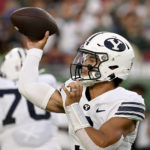 
              BYU quarterback Jaren Hall looks to throw a pass during the first half of an NCAA college football game against South Florida, Saturday, Sept. 3, 2022, in Tampa, Fla. (AP Photo/Jason Behnken)
            
