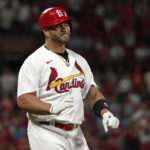 
              St. Louis Cardinals' Albert Pujols reacts after flying out during the third inning of a baseball game against the Milwaukee Brewers Tuesday, Sept. 13, 2022, in St. Louis. (AP Photo/Jeff Roberson)
            