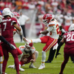 
              Kansas City Chiefs safety Justin Reid (20) kicks an extra point against the Arizona Cardinals during the first half of an NFL football game, Sunday, Sept. 11, 2022, in Glendale, Ariz. (AP Photo/Ross D. Franklin)
            