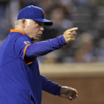 
              New York Mets manager Buck Showalter signals for a pitching change during the first inning of the team's baseball game against the Chicago Cubs on Wednesday, Sept. 14, 2022, in New York. (AP Photo/Adam Hunger)
            