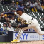 
              Milwaukee Brewers' Freddy Peralta throws during the seventh inning of a baseball game against the Miami Marlins Thursday, Sept. 29, 2022, in Milwaukee. (AP Photo/Morry Gash)
            