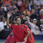 
              FILE - Roger Federer of Switzerland waves to spectators as he leaves the court after he lost to Alexander Zverev of Germany in their men's singles quarterfinals match at the Shanghai Masters tennis tournament at Qizhong Forest Sports City Tennis Center in Shanghai, China, Oct. 11, 2019. Federer announced Thursday, Sept. 15, 2022 he is retiring from tennis. (AP Photo/Andy Wong, File)
            