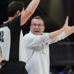 
              Connecticut Sun coach Curt Miller, right, reacts to a call during the second half of Game 2 of the team's WNBA basketball playoffs semifinal against the Chicago Sky, Wednesday, Aug. 31, 2022, in Chicago. The Sky won 85-77. (AP Photo/Nam Y. Huh)
            