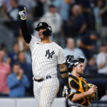 
              New York Yankees' Gleyber Torres gestures to fans as he walks past Pittsburgh Pirates catcher Jason Delay after hitting a three-run home run during the eighth inning of a baseball game Wednesday, Sept. 21, 2022, in New York. (AP Photo/Frank Franklin II)
            