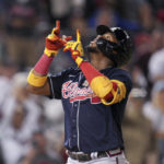 
              Atlanta Braves' Ronald Acuna Jr. celebrates after hitting his second solo home run against the Washington Nationals during the seventh inning of a baseball game at Nationals Park, Tuesday, Sept. 27, 2022, in Washington. The Braves won 8-2. (AP Photo/Jess Rapfogel)
            