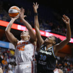 
              Connecticut Sun center Brionna Jones shoots as Chicago Sky forward Azura Stevens, right, defends during the second half of Game 4 of a WNBA basketball playoff semifinal Tuesday, Sept. 6, 2022, in Uncasville, Conn. (AP Photo/Jessica Hill)
            