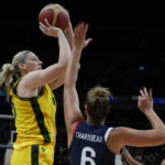 
              Australia's Lauren Jackson takes a shot at goal as France's Alexia Chartereau attempts to block during their game at the women's Basketball World Cup in Sydney, Australia, Thursday, Sept. 22, 2022. (AP Photo/Mark Baker)
            