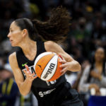
              Sue Bird begins an offensive run during the first half in Game 3 of a WNBA basketball semifinal playoff series against the Las Vegas Aces, Sunday, Sept. 4, 2022, in Seattle. (AP Photo/Lindsey Wasson)
            
