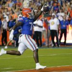 
              Florida running back Trevor Etienne celebrates as he crosses the goal line for an 11-yard touchdown run during the first half of an NCAA college football game against Kentucky, Saturday, Sept. 10, 2022, in Gainesville, Fla. (AP Photo/John Raoux)
            