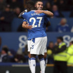 
              Everton's Neal Maupay celebrates scoring their side's first goal of the game with team-mate Idrissa Gueye during the English Premier League soccer  match between Everton and West Ham, at Goodison Park, Liverpool, England, Sunday Sept. 18, 2022. (Isaac Parkin/PA via AP)
            