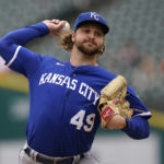 
              Kansas City Royals pitcher Jonathan Heasley throws against the Detroit Tigers in the first inning of a baseball game in Detroit, Thursday, Sept. 29, 2022. (AP Photo/Paul Sancya)
            