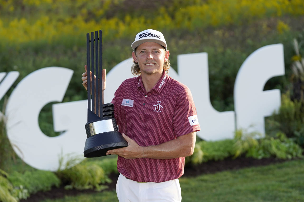 Cameron Smith poses with the champion's trophy after winning the LIV Golf Invitational-Chicago tour...