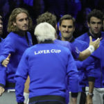 
              Team Europe's Casper Ruud celebrates with teammates after winning a match against Team World's Jack Sock on day one of the Laver Cup tennis tournament at the O2 in London, Friday, Sept. 23, 2022. (AP Photo/Kin Cheung)
            