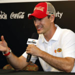 
              Joey Logano answers a question from a reporter during a media availability before a NASCAR Cup Series auto race at Daytona International Speedway, Friday, Aug. 26, 2022, in Daytona Beach, Fla. (AP Photo/Terry Renna)
            