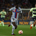 
              Barcelona's Franck Kessie, left, is challenged by Manchester City's Kalvin Phillips during a charity friendly soccer match between Barcelona and Manchester City at the Camp Nou stadium in Barcelona, Spain, Wednesday, Aug. 24, 2022. (AP Photo/Joan Monfort)
            