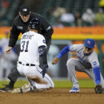 
              Detroit Tigers center fielder Riley Greene (31) slides safely into second base as Kansas City Royals second baseman Nicky Lopez (8) can't make the catch in the third inning of a baseball game in Detroit, Wednesday, Sept. 28, 2022. (AP Photo/Paul Sancya)
            
