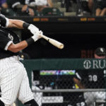 
              Chicago White Sox's Andrew Vaughn hits a ground-rule double during the fourth inning of a baseball game against the Minnesota Twins in Chicago, Friday, Sept. 2, 2022. (AP Photo/Nam Y. Huh)
            