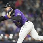 
              Colorado Rockies relief pitcher Justin Lawrence works against the Arizona Diamondbacks during the sixth inning of a baseball game Saturday, Sept. 10, 2022, in Denver. (AP Photo/David Zalubowski)
            