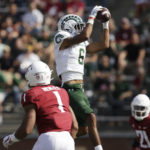 
              Colorado State wide receiver Ty McCullouch (6) catches a pass near Washington State linebacker Daiyan Henley (1) during the first half of an NCAA college football game, Saturday, Sept. 17, 2022, in Pullman, Wash. (AP Photo/Young Kwak)
            