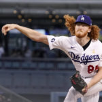 
              Los Angeles Dodgers starting pitcher Dustin May throws to the plate during the first inning of a baseball against the San Diego Padres game Friday, Sept. 2, 2022, in Los Angeles. (AP Photo/Mark J. Terrill)
            