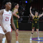 
              Australia's Sami Whitcomb reacts after shooting a goal during their game at the women's Basketball World Cup against Canada in Sydney, Australia, Monday, Sept. 26, 2022. (AP Photo/Mark Baker)
            
