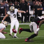 
              during the second half of an NFL football game, Sunday, Sept. 11, 2022, in Atlanta. The New Orleans Saints won 27-26. (AP Photo/John Bazemore)
            