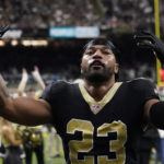 
              New Orleans Saints cornerback Marshon Lattimore reacts after being thrown out of the game after a brawl against the Tampa Bay Buccaneers during the second half of an NFL football game in New Orleans, Sunday, Sept. 18, 2022. (AP Photo/Gerald Herbert)
            