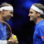 
              Team Europe's Roger Federer, right, and Rafael Nadal react during their Laver Cup doubles match against Team World's Jack Sock and Frances Tiafoe at the O2 arena in London, Friday, Sept. 23, 2022. (AP Photo/Kin Cheung)
            