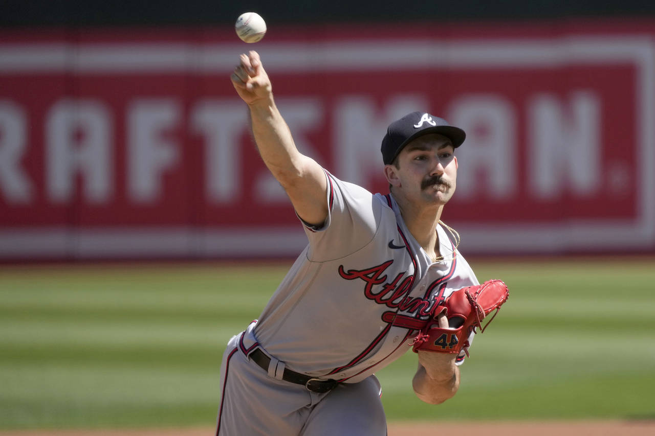 Atlanta Braves starting pitcher Spencer Strider throws against the Oakland Athletics during the fir...