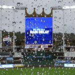 
              A rain delay message is seen on the scoreboard during the eighth inning of a baseball game between the Detroit Tigers and the Kansas City Royals on Saturday, Sept. 10, 2022, in Kansas City, Mo. (AP Photo/Jay Biggerstaff)
            