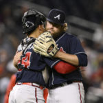 
              Atlanta Braves starting pitcher Bryce Elder, right, celebrates with catcher William Contreras, left, after a baseball game against the Washington Nationals, Monday, Sept. 26, 2022, in Washington. (AP Photo/Nick Wass)
            
