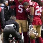 
              San Francisco 49ers quarterback Trey Lance (5) is helped onto a cart during the first half of an NFL football game against the Seattle Seahawks in Santa Clara, Calif., Sunday, Sept. 18, 2022. (AP Photo/Tony Avelar)
            