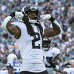 
              Jacksonville Jaguars safety Rayshawn Jenkins (2) celebrates during the second half of an NFL football game against the Indianapolis Colts , Sunday, Sept. 18, 2022, in Jacksonville, Fla. (AP Photo/Gary McCullough)
            