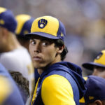 
              Milwaukee Brewers' Christian Yelich stands in the dugout during the ninth inning of the team's baseball game against the Arizona Diamondbacks on Friday, Sept. 2, 2022, in Phoenix. The Diamondbacks won 2-1. (AP Photo/Ross D. Franklin)
            