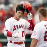 
              Los Angeles Angels designated hitter Shohei Ohtani (17) is greeted by Mike Trout (27) after hitting a home run during the seventh inning of a baseball game against the Detroit Tigers in Anaheim, Calif., Wednesday, Sept. 7, 2022. (AP Photo/Ashley Landis)
            