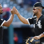 
              Chicago White Sox first baseman Jose Abreu, right, and Eloy Jimenez, left, celebrate a win over the Cleveland Guardians in a baseball game, Thursday, Sept. 15, 2022, in Cleveland. (AP Photo/Ron Schwane)
            