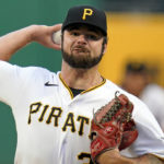 
              Pittsburgh Pirates starting pitcher Bryse Wilson delivers during the first inning of the team's baseball game against the Chicago Cubs in Pittsburgh, Friday, Sept. 23, 2022. (AP Photo/Gene J. Puskar)
            