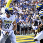 
              Delaware tight end Bryce De Maille (81) celebrtaes his touchdown with wide receiver Thyrick Pitts, right, during the first half of an NCAA college football game against Navy, Saturday, Sept. 3, 2022, in Annapolis, Md. (AP Photo/Nick Wass)
            