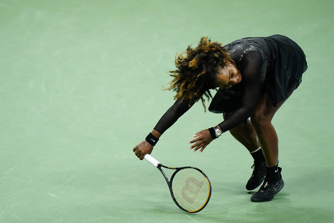 Serena Williams, of the United States, returns a shot to Ajla Tomljanovic, of Austrailia, during th...